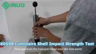 How do you test IEC 60598-1 luminaire shell impact strength?